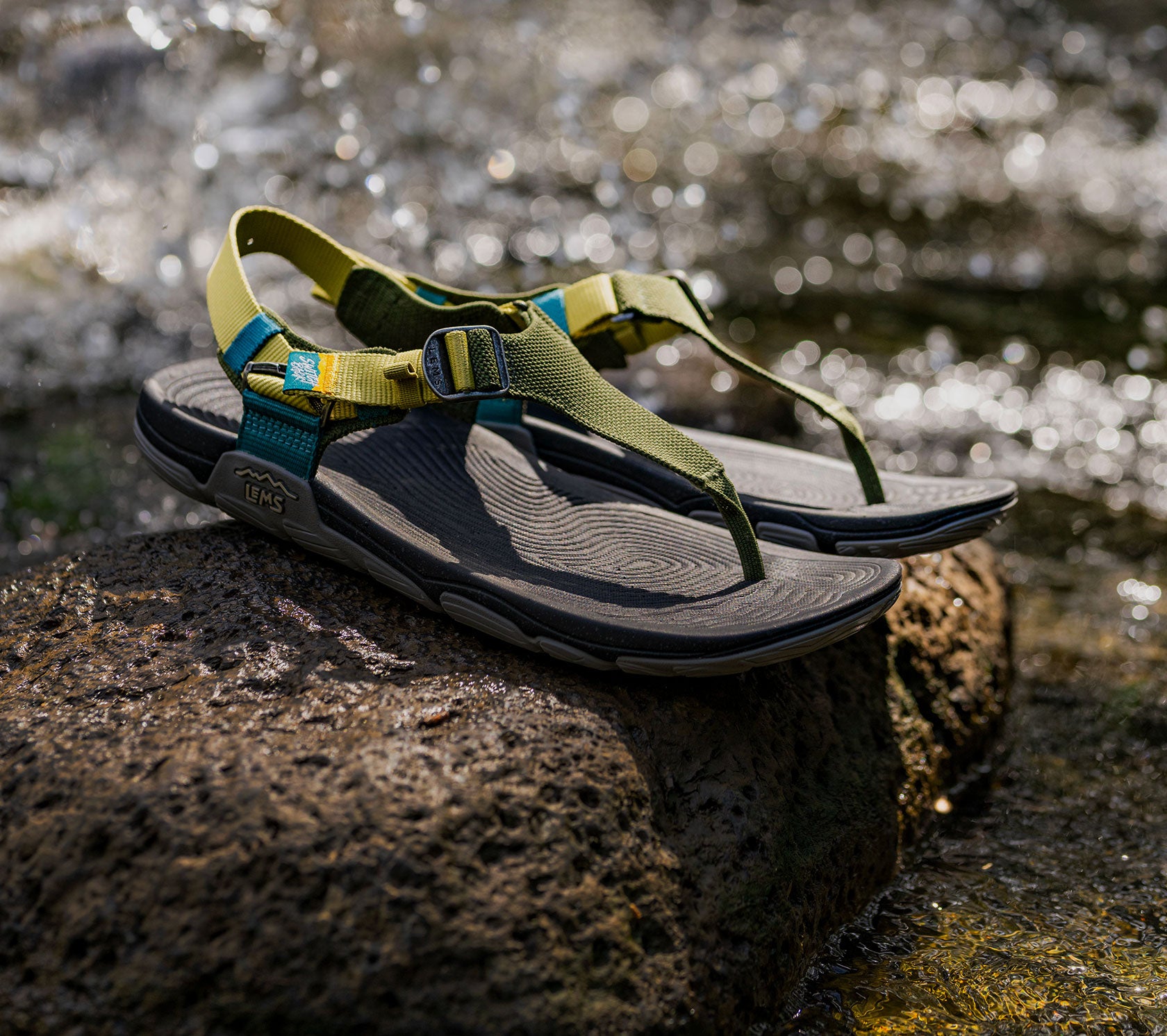 Switchback Sandal Knit Ivy, on rock in nature