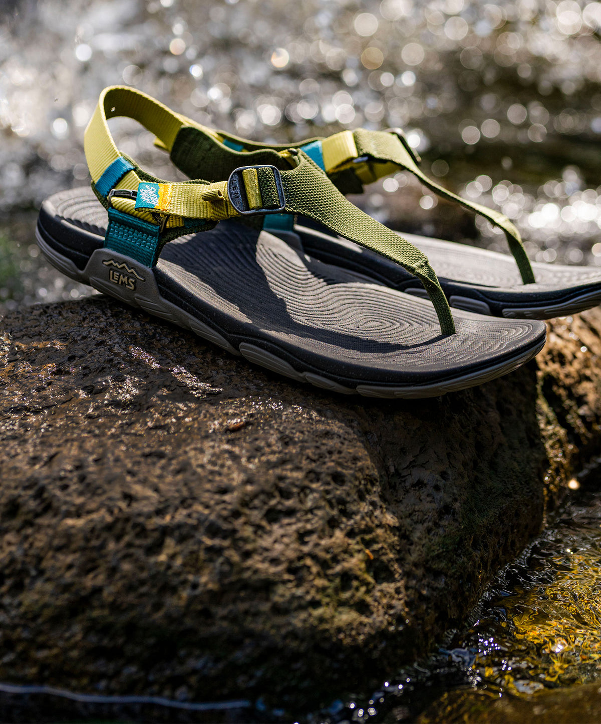 Switchback Sandal Knit Ivy, on rock in nature