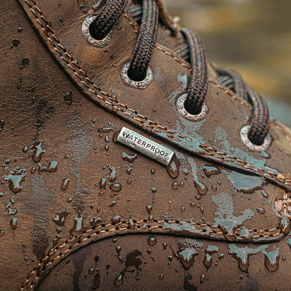 Leather boot with water droplets
